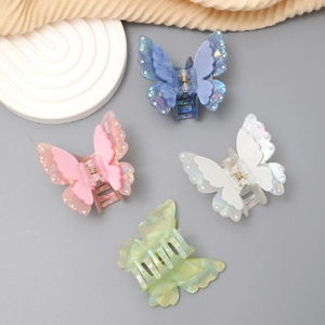 Exquisite double-layered butterfly hair claws with shimmering crystals in four pastel colors