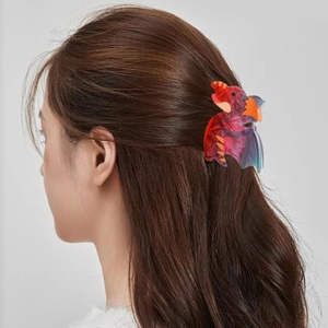 Elegante molletta per capelli a forma di dinosauro rosa in acetato colorato per donna