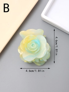 Detailed macro view showing the 4.6cm acetate 3D rose hair claw clip with glitter texture
