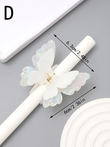 Detail view of the iridescent butterfly hair claw clip with size dimensions 6.3cm and rhinestones