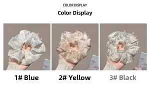 Detailed color display of vintage floral organza scrunchies in blue, coffee and black