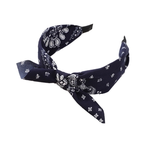 Navy blue paisley print headband with a knotted bow design for a vintage retro look