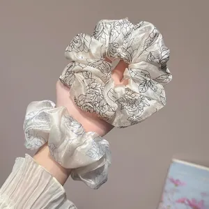 Elegant white satin rose floral scrunchie set for women with silk texture and volume