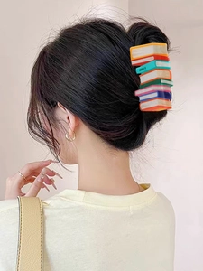 Creative book stack hair claw clip made of colorful acrylic for elegant updos