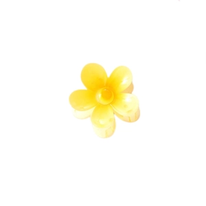 Vibrant yellow plumeria hair claw clip for beach holidays and elegant updos