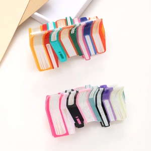 Creative book-shaped hair claw clips made of colorful acrylic with a glossy water ripple finish