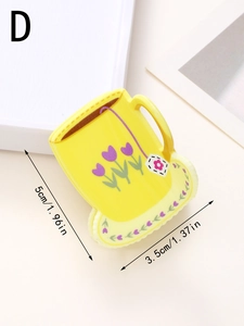 Nahaufnahme der gelben Kaffeetassen-Haarklammer mit Tulpen-Print, 5cm x 3,5cm