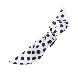 Elegant polka dot bow claw clip in black and white fabric for stylish hair styling