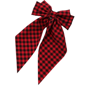 Classic red and black buffalo plaid bow hair clip with long ribbons on white background