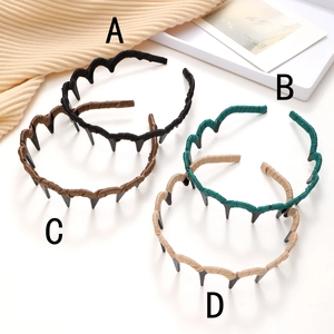Set of four wavy resin headbands with non-slip teeth in multi-color fabric finishes