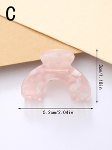 Detail view of pink marble acetate hair claw clip showing 5.2cm width dimensions