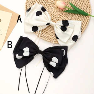 Polka dot bow hair clip in satin fabric with streamers for women styling