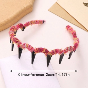 Detail showing wavy headband with pink and yellow woven texture and 36cm circumference
