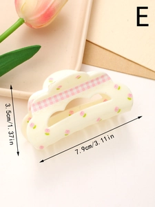 Detail view of a floral bow hair claw clip showing dimensions 7.9cm length and 3.5cm height