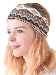 Detail of bohemian geometric pattern on wide elastic yoga headband for women