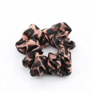 Chic leopard print scrunchie in dusty rose and black pleated satin silk fabric