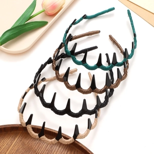 Set of four woven resin wave headbands in blue, brown, black, and beige colors