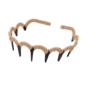 Wavy resin hairband with khaki textured ribbon for styling hair with high crown effect