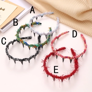 Set of five wavy colorful fabric wrapped headbands with teeth in various stylish patterns
