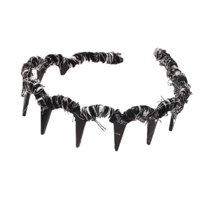 Punk style spiked headband with black and white rope wrapping for high skull top hair accessory