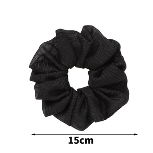 Elegant black oversized 15cm scrunchie in sheer pleated fabric for hair styling