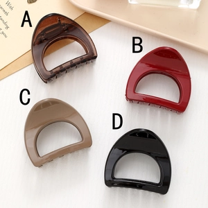Minimalist D-shaped hair claw clips in four assorted colors for high ponytail styles