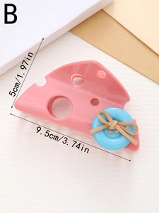 Pink cheese shaped hair claw clip with blue button and bow details and size dimensions