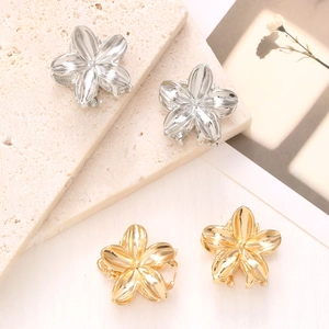 Elegant floral metal hair claws in gold and silver finish for stylish hair styling