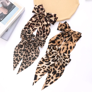 Barrette à Cheveux Nœud Imprimé Léopard avec Longs Rubans Accessoires de Queue de Cheval en Tissu Motif Animal pour Femme