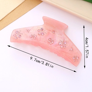 Pince à cheveux en acétate rose avec strass et paillettes, dimensions 9,7 cm x 4 cm