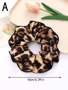 Detail of 16cm oversized leopard print satin hair scrunchie with smooth silk texture
