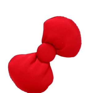 Cute red fabric bow hair clip for women with detailed stitching on white background