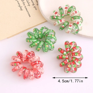 Détail d'élastiques spirale de Noël 4,5cm avec motifs festifs et étiquette de taille