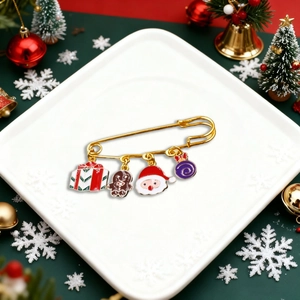 Christmas enamel safety pin brooch with festive tree, Santa and gingerbread man charms