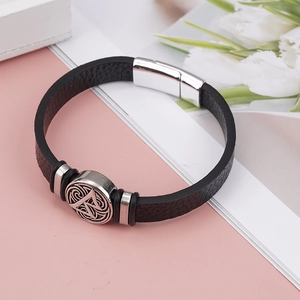 Men's leather bracelet with silver Valknut charm and magnetic buckle in Viking style