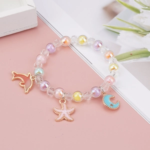 Charming children's beaded bracelet with dolphin, starfish, and moon charms