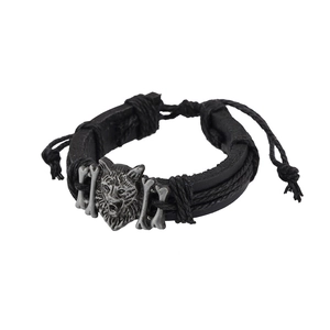 Vintage punk men's braided leather bracelet featuring a detailed wolf head metal charm