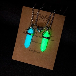 Glow in the dark hexagonal prism necklaces with magnetic heart charm on display card