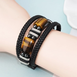 Braided leather bracelet for men featuring tiger eye stones and a magnetic clasp
