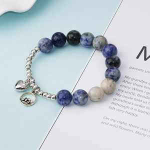 Bracelet de perles en pierre naturelle bleue avec breloques cœur et vague en argent chic