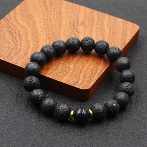 Bracelet pour homme en pierre de lave noire avec pierre de sable bleue et métal doré
