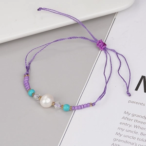 Handmade purple woven rope bracelet with adjustable freshwater pearl and crystal beads