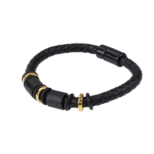 Men's braided black leather bracelet with textured gold and black metal charms