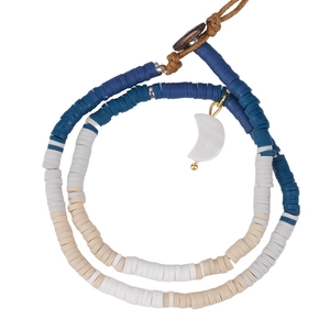 Bohemian beaded necklace with blue and white resin discs and a white crescent moon charm