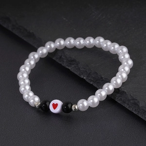 Bracelet tendance en perles et obsidienne noire avec cœur et perles intercalaires