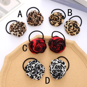Elegant leopard print rose hair scrunchies in four vintage colors with elastic ties