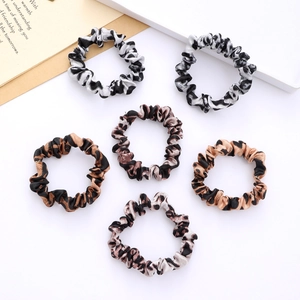 6-pack of satin animal print scrunchies with leopard and cow patterns for women
