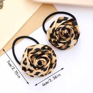 Detailed size view of leopard print rose hair scrunchie showing 7cm and 6cm dimensions
