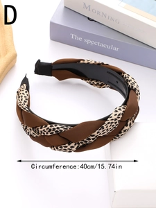 Detail of braided brown and leopard print headband with non-slip teeth and 40cm length