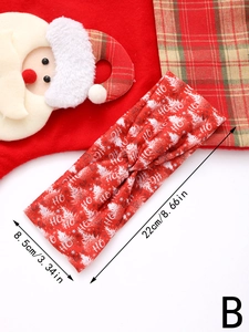 Detailed view of red Christmas headband showing size dimensions and HO HO HO print pattern